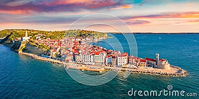 Ð¡harm of the ancient cities of Europe. Bright morning cityscape of Piran town. Stock Photo